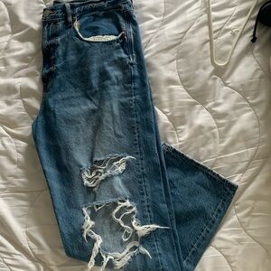 American Eagle very distressed jeans.